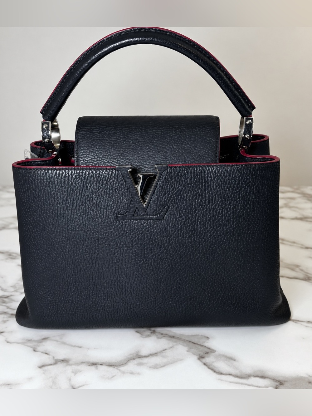 Louis Vuitton Capucines BB bag in Dark Navy Blue with hot pink interior